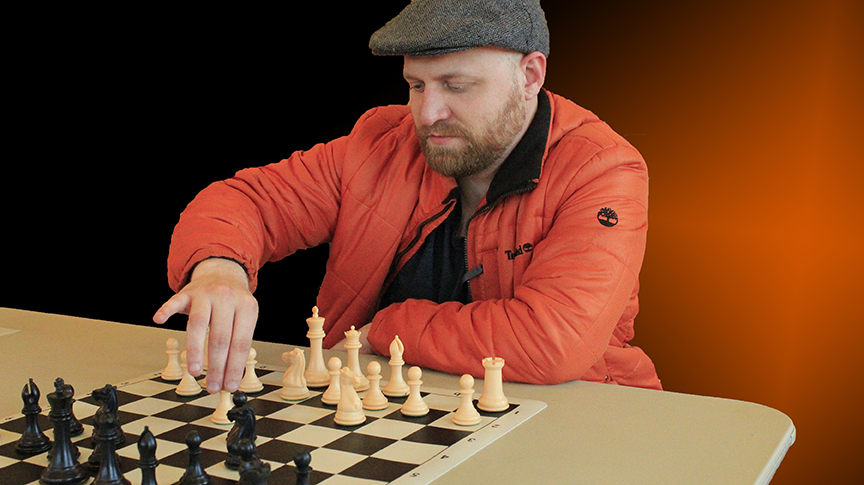 TEXAS CHESS ROOKIE ADAM HART DEMONSTRATES HOW HE OUTPLAYED HIS OPPONENT IN ROUND TWO