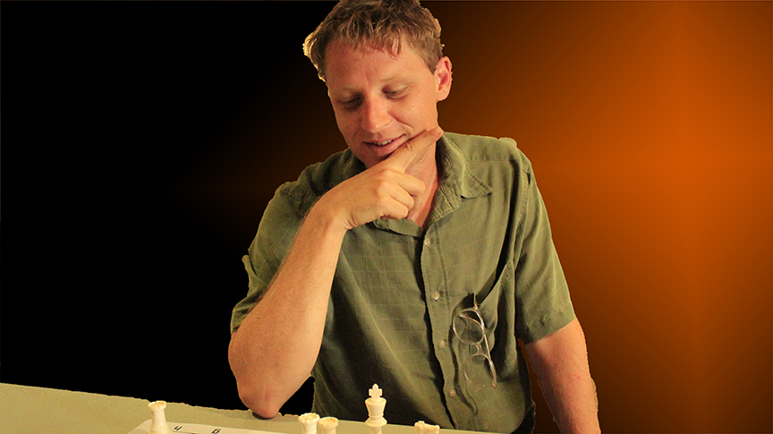 CHESS EXPERT CHUCK JOHNSON - PHOTO AND GRAPHICS BY JIM HOLLINGSWORTH