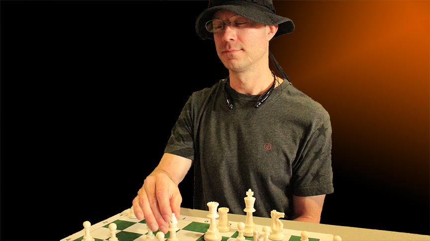 DAN HENSON PRACTICING BLINDFOLD CHESS WITHOUT THE BANDANA - PHOTO AND GRAPHICS BY JIM HOLLINGSWORTH